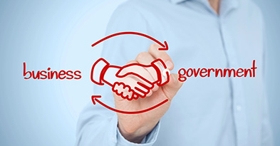 Illustration of handshake symbolizing partnership between business and government, representing cybersecurity solutions for government vendors.