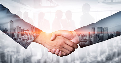 Overlay image featuring a handshake, cityscape, and professionals, symbolizing strategic cybersecurity partnerships for collaborative projects.